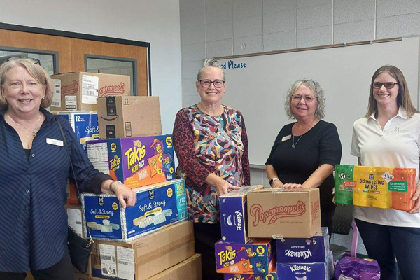 Bank employees volunteering with children